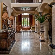 Custom ceiling designs and Spanish plaster and custom glazed columns first floor view